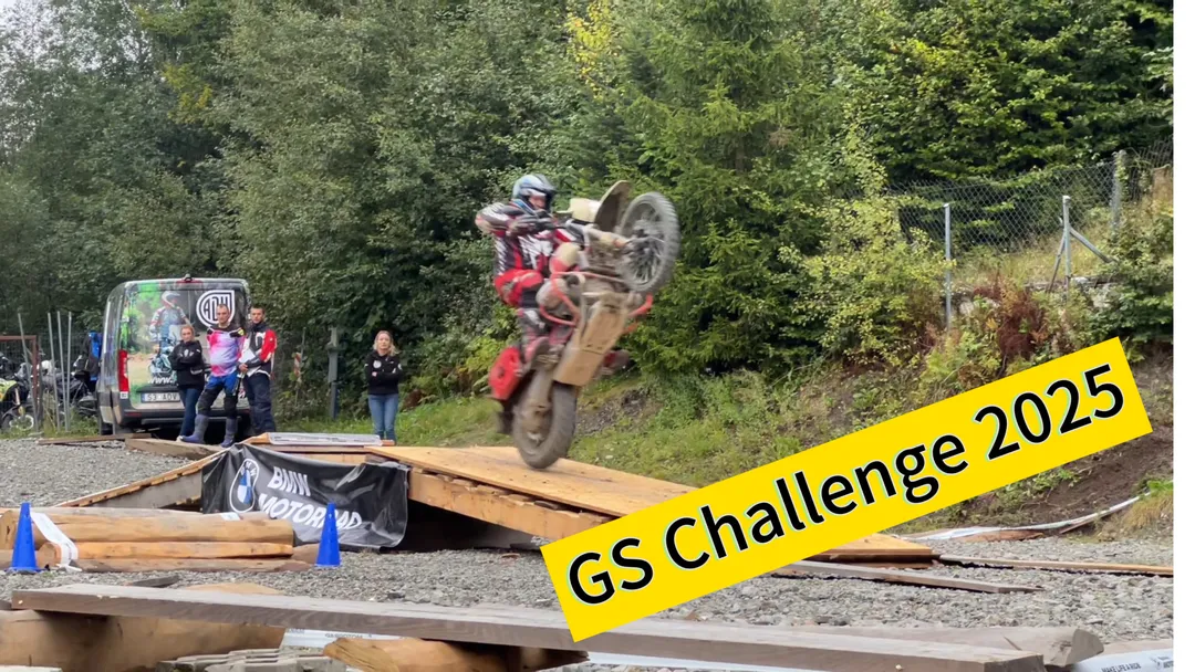 BMW motorcycles parked under the Adam Małysz ski jump in Wisła during BMW Motorrad Days Poland 2025